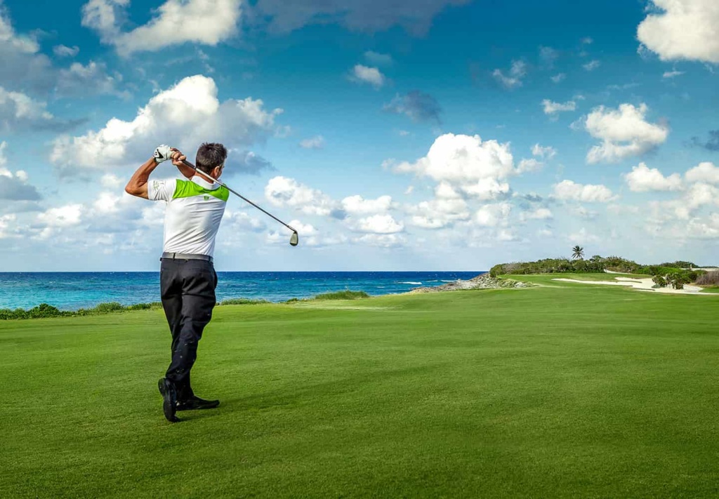 play of golf in the caribbean with a blue sky